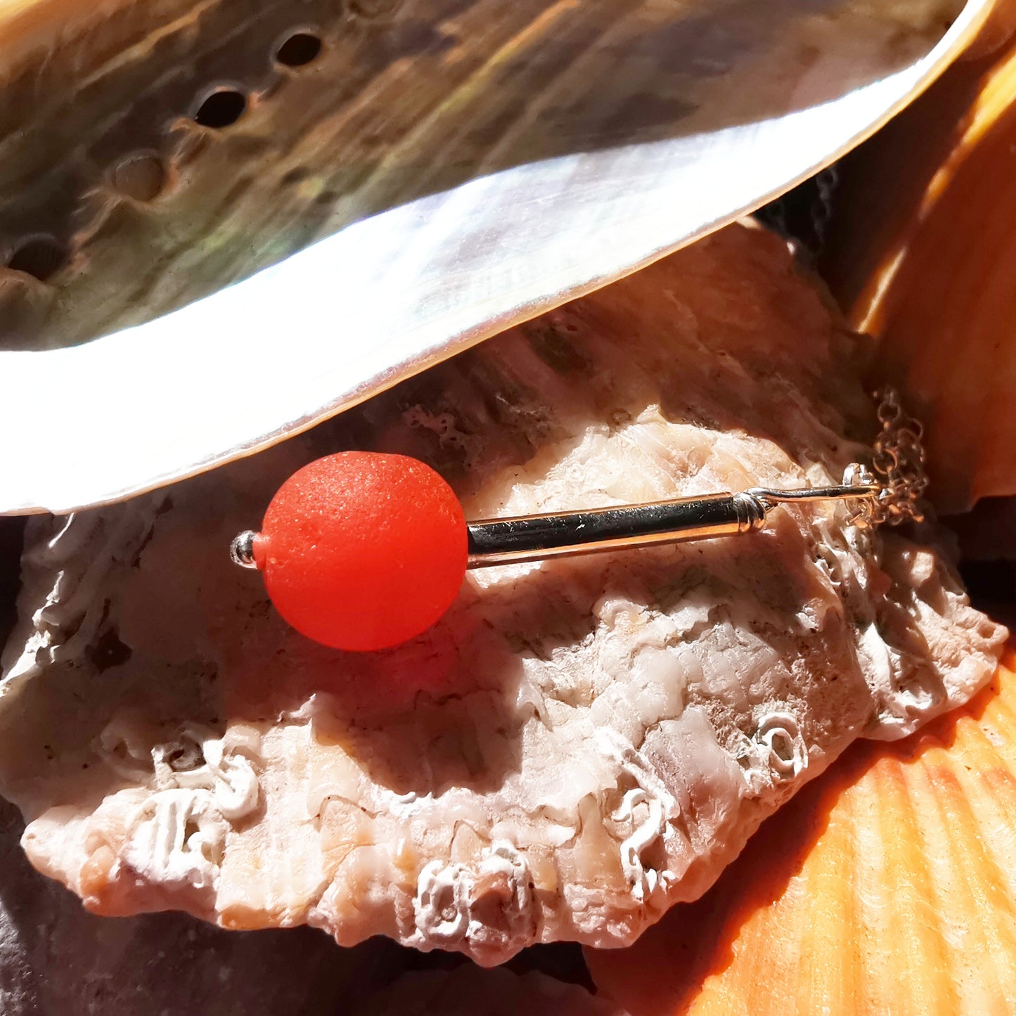 Scottish orange sea glass bead & sterling silver pendant.
