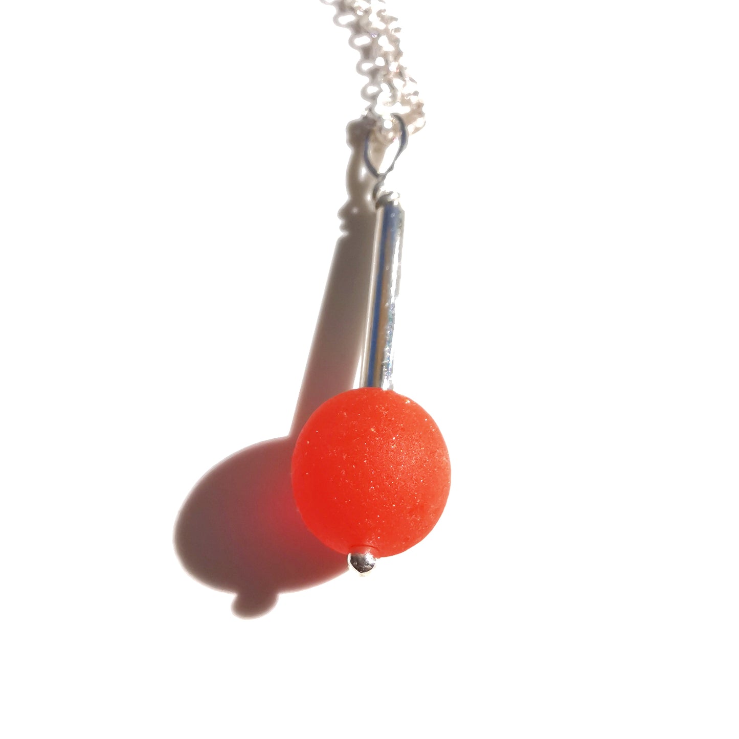 Scottish orange sea glass bead & sterling silver pendant.