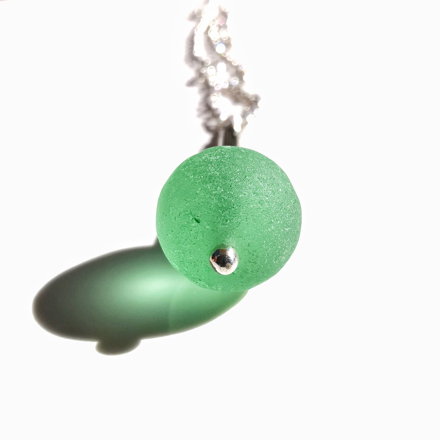 Scottish UV green sea glass bead & sterling silver pendant.
