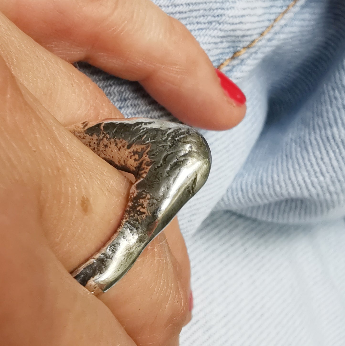 One of a kind molten silver statement ring.