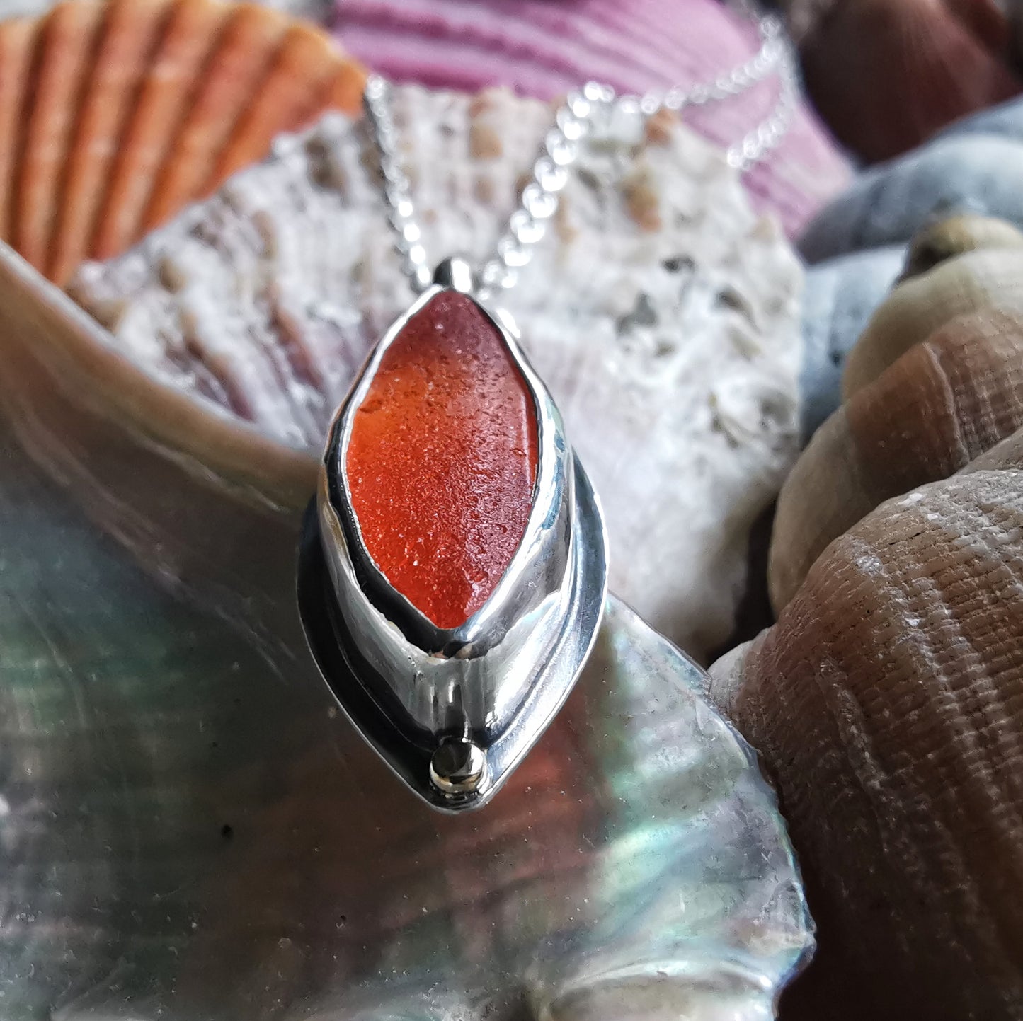 Scottish UV deep orange sea glass, sterling silver and 9ct gold pendant.