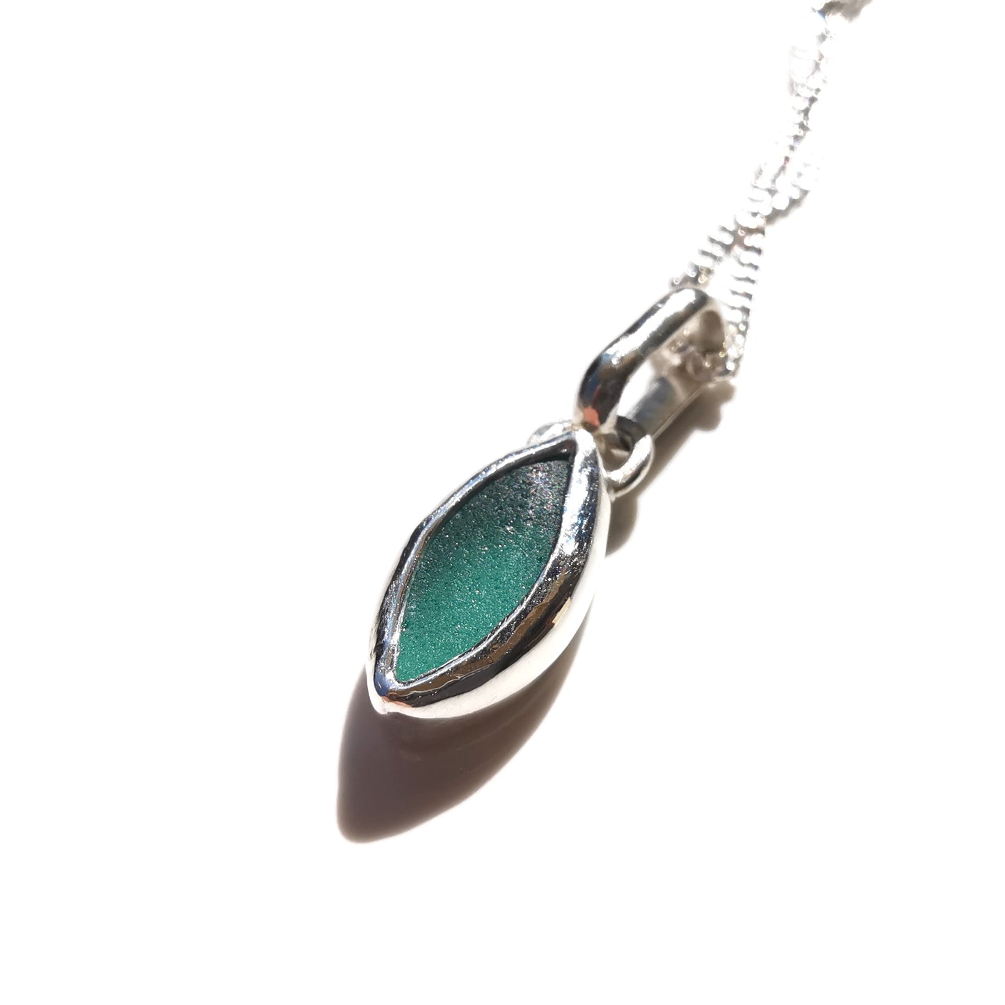 Tiny Scottish teal sea glass & sterling silver pendant.