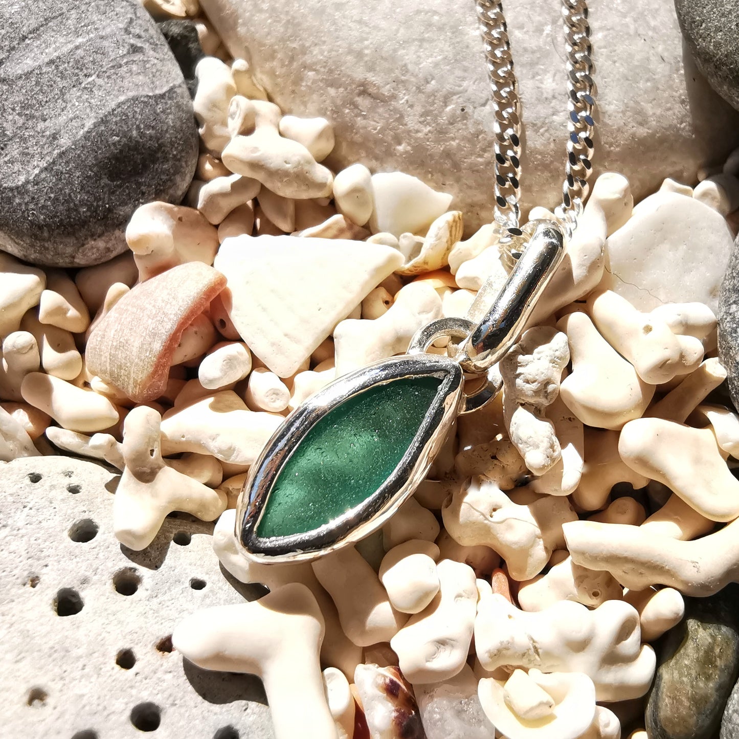 Tiny Scottish teal sea glass & sterling silver pendant.