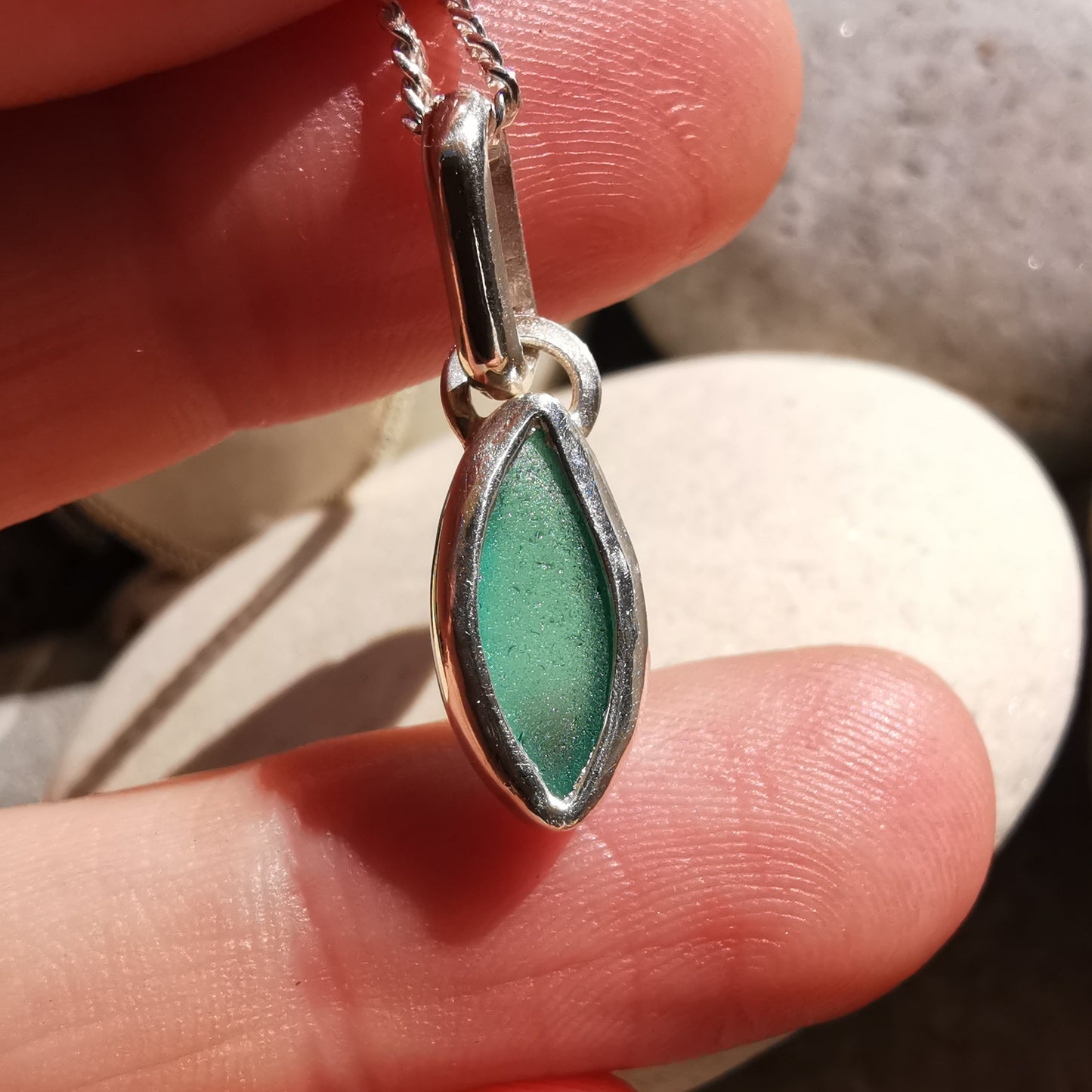 Tiny Scottish teal sea glass & sterling silver pendant.