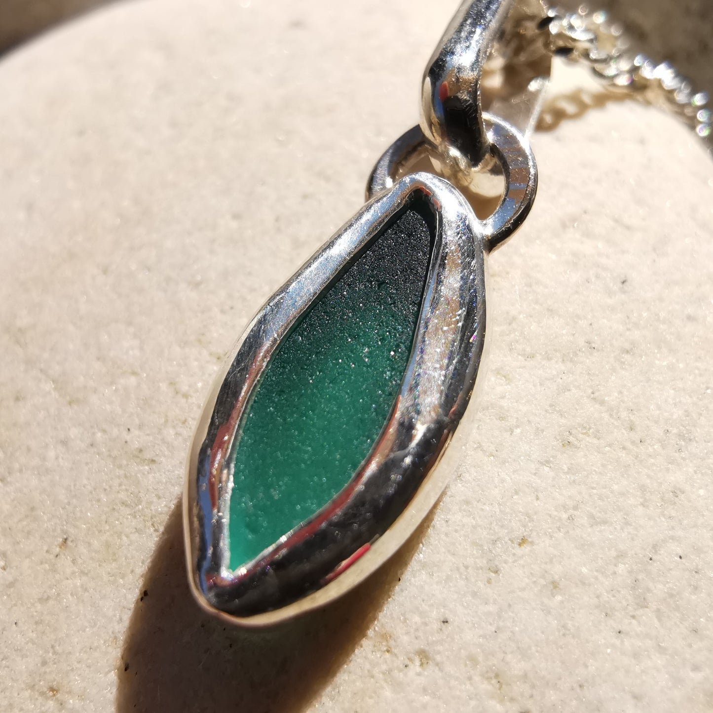 Tiny Scottish teal sea glass & sterling silver pendant.