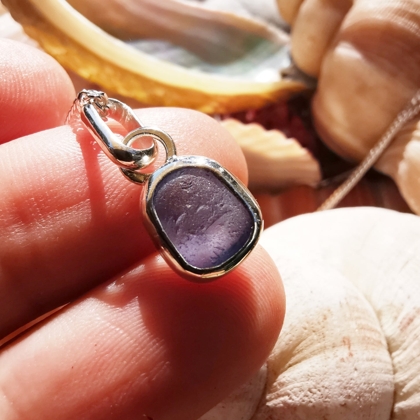 Tiny Scottish cornflower blue sea glass & sterling silver pendant.