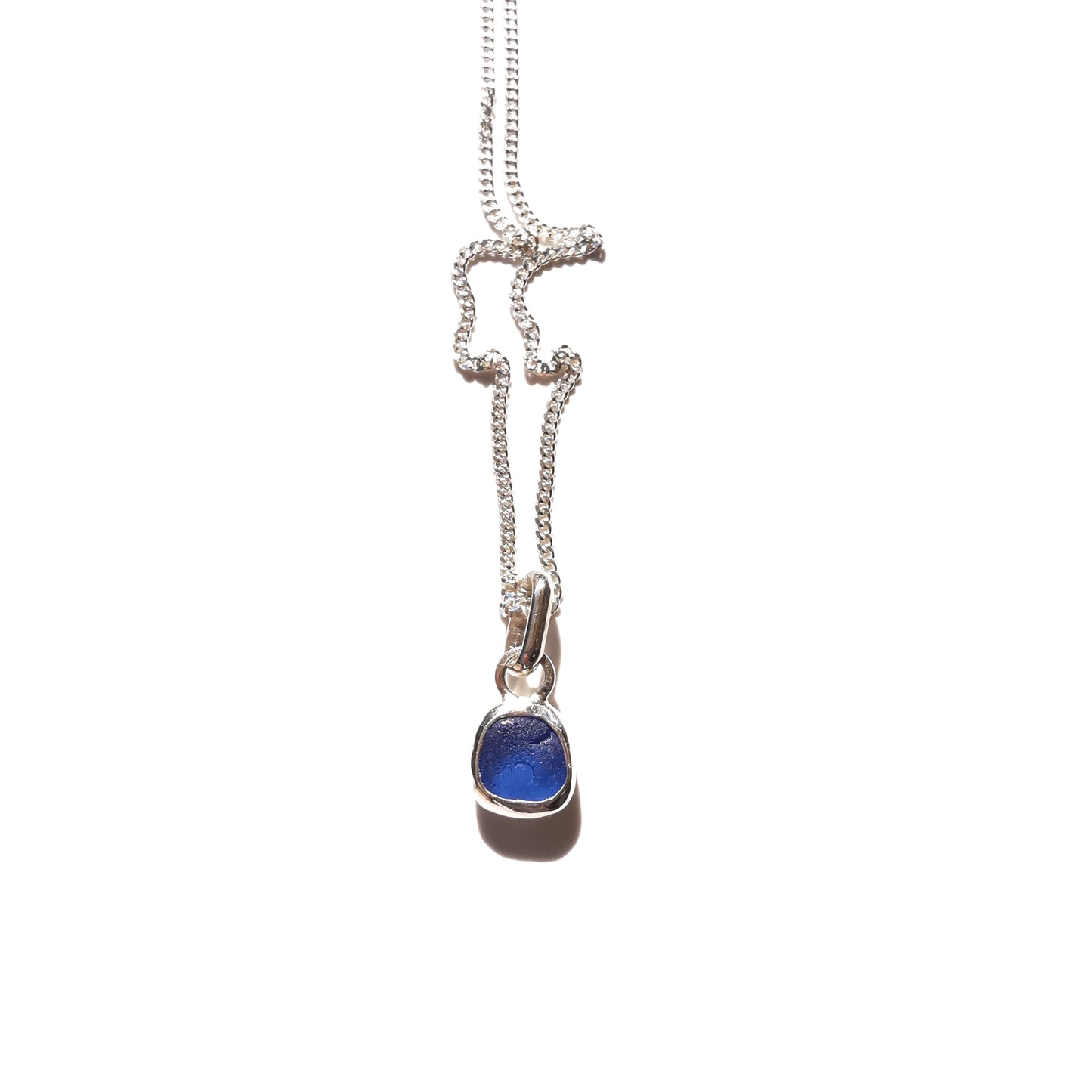 Tiny Scottish cornflower blue sea glass & sterling silver pendant.