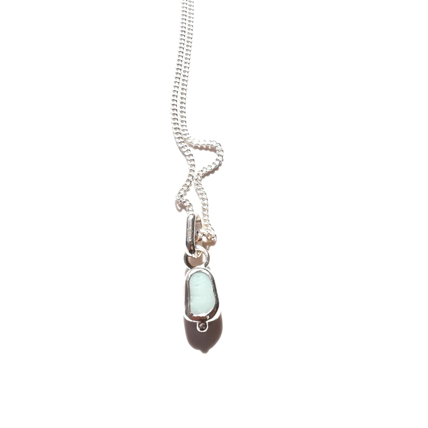Tiny Scottish UV milk sea glass & sterling silver pendant.
