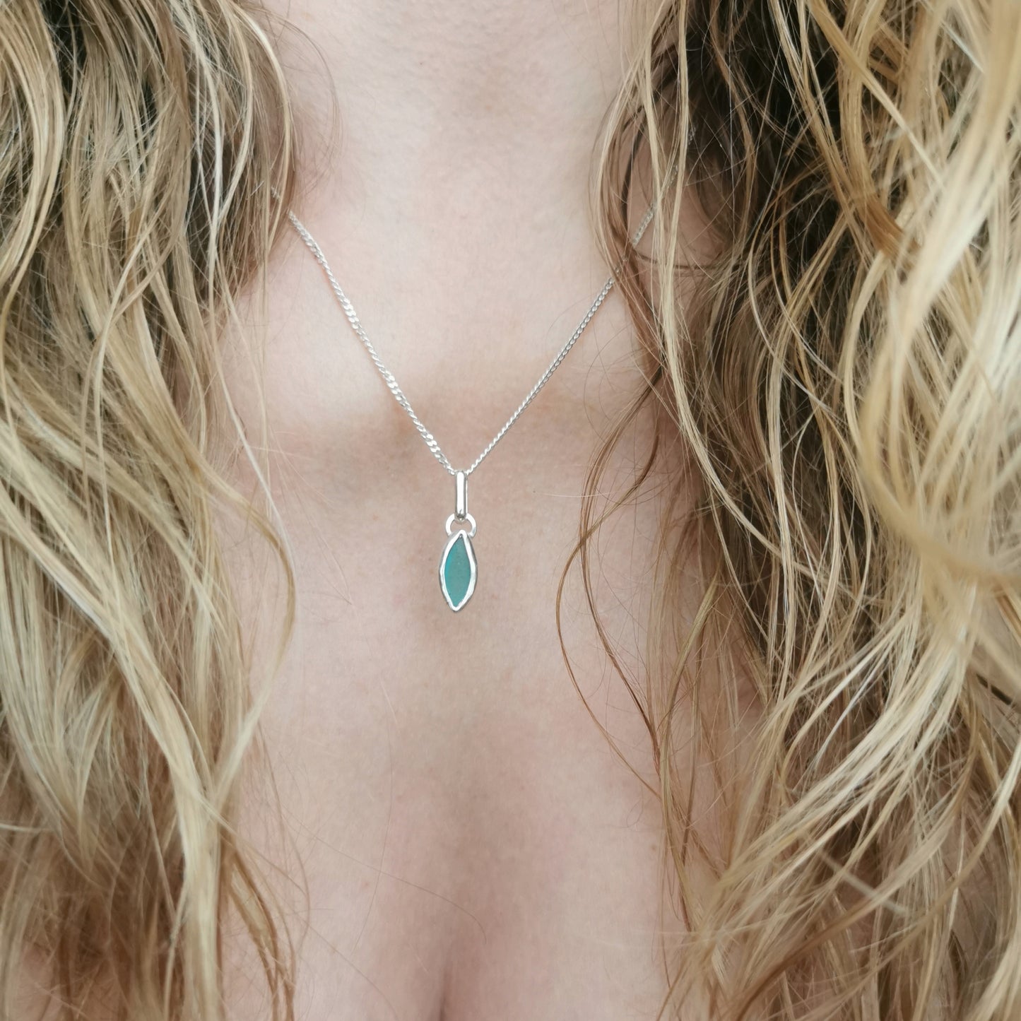 Tiny Scottish teal sea glass & sterling silver pendant.