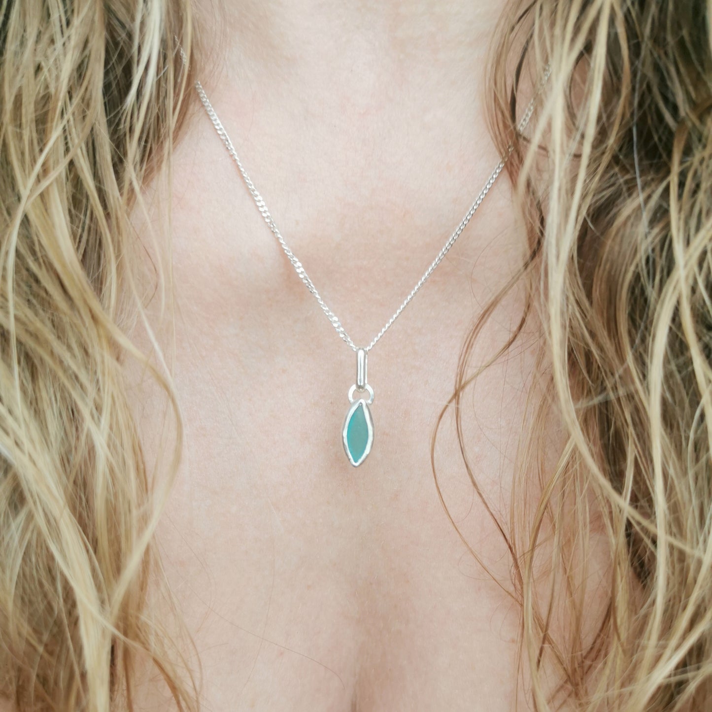 Tiny Scottish teal sea glass & sterling silver pendant.