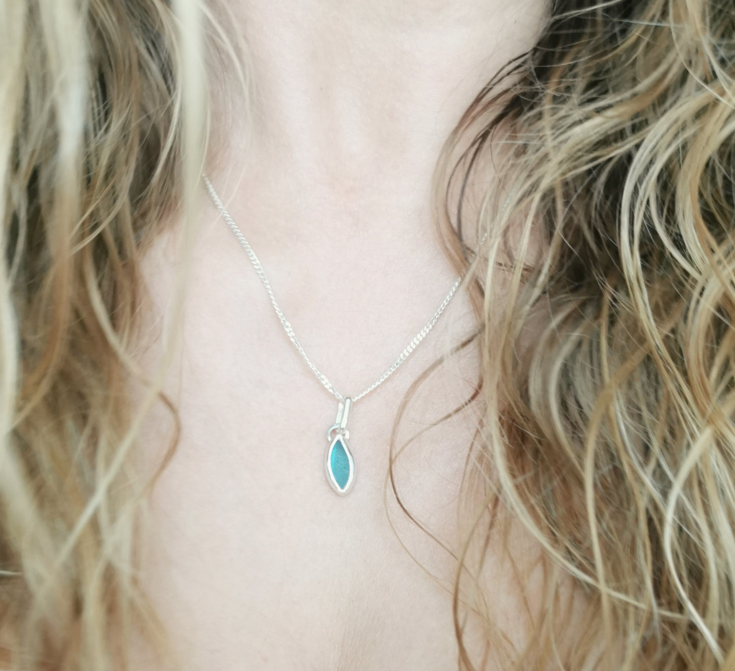 Tiny Scottish teal sea glass & sterling silver pendant.