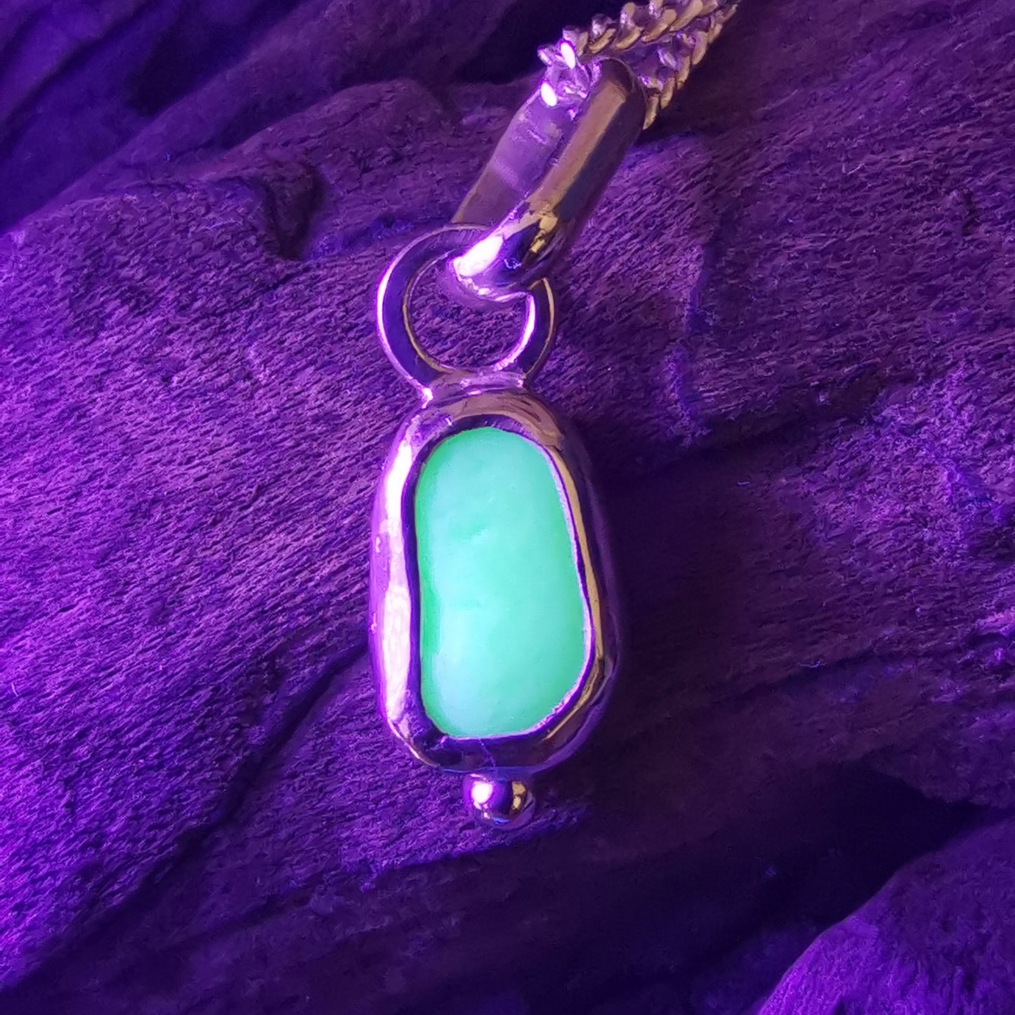 Tiny Scottish UV milk sea glass & sterling silver pendant.