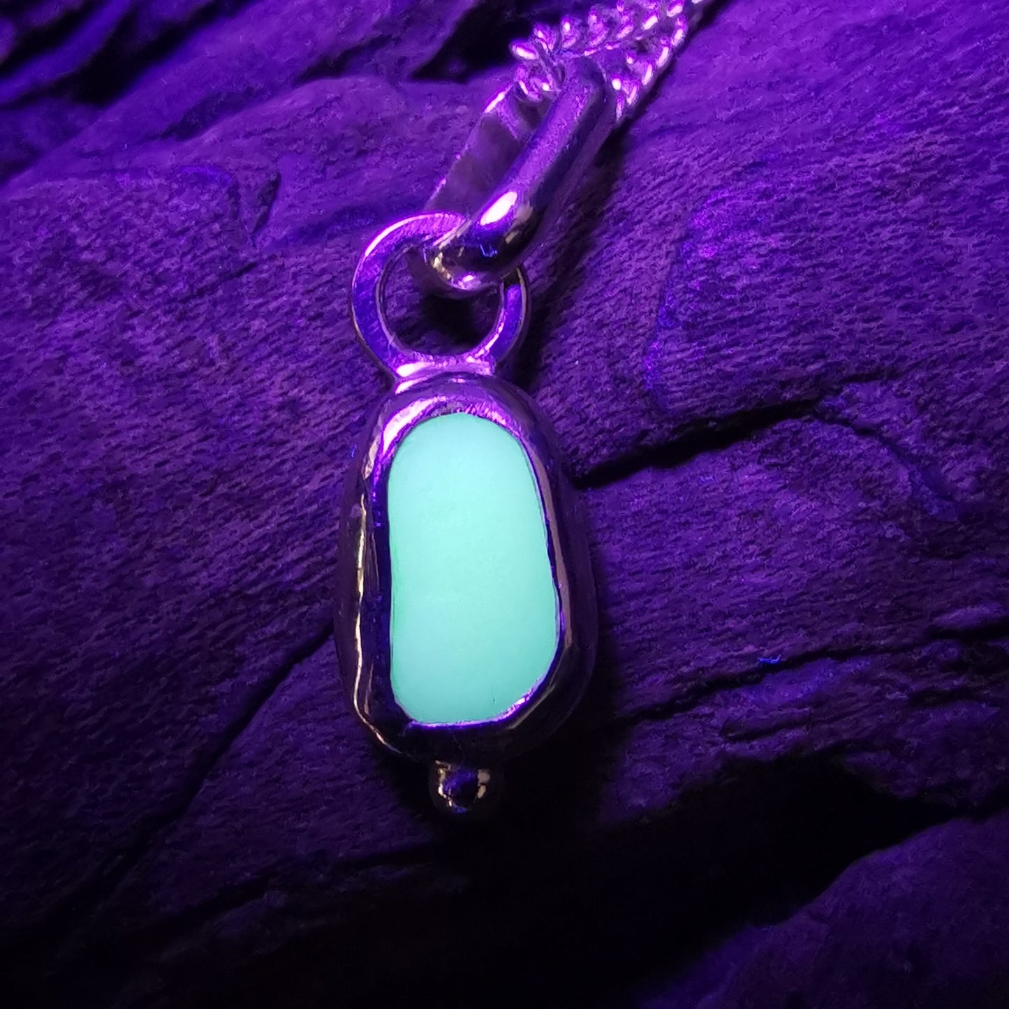 Tiny Scottish UV milk sea glass & sterling silver pendant.