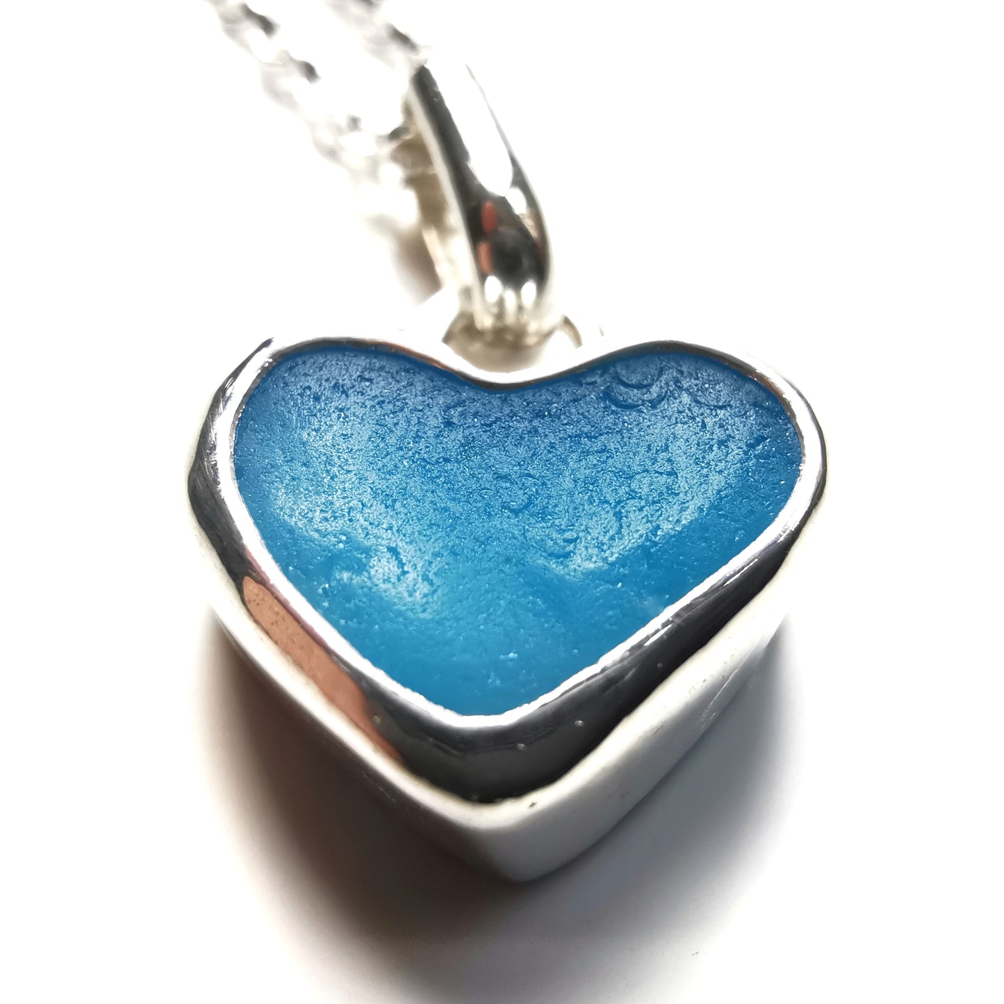Aquamarine blue sea glass heart & sterling silver pendant.