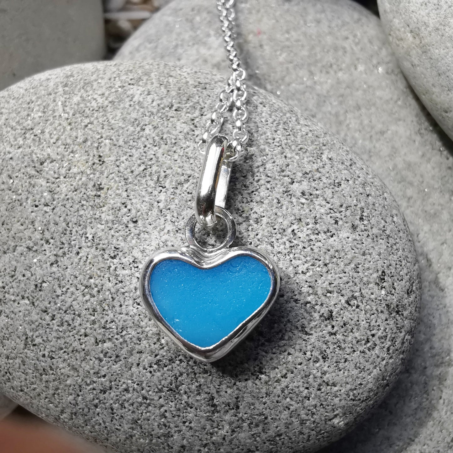 Aquamarine blue sea glass heart & sterling silver pendant.