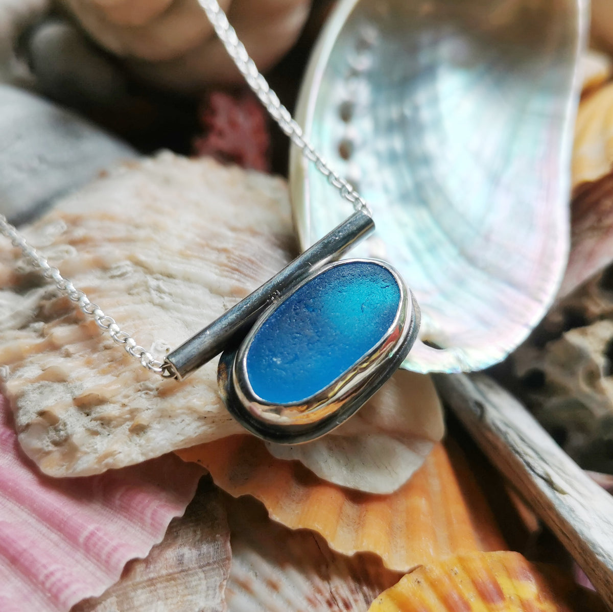 Scottish blue sea glass & sterling silver pendant.
