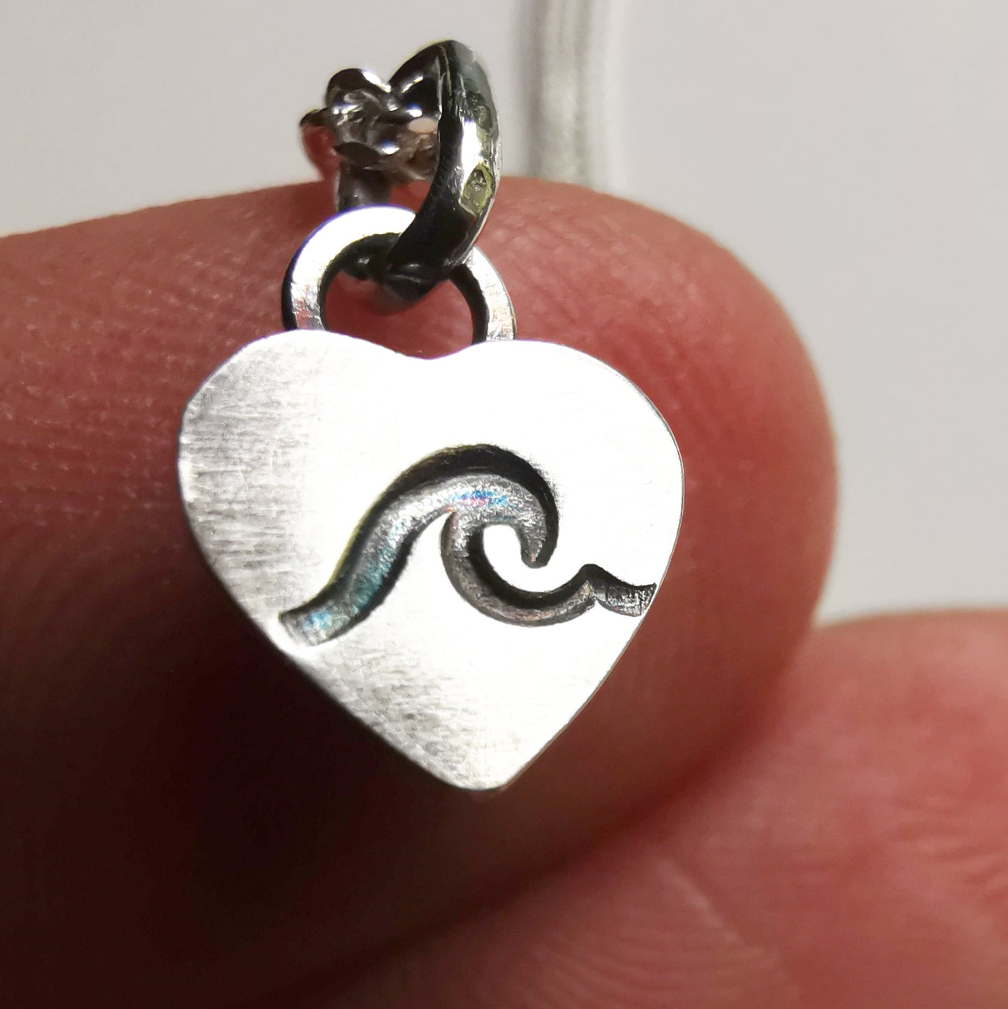 Tiny pink sea glass heart & sterling silver pendant.