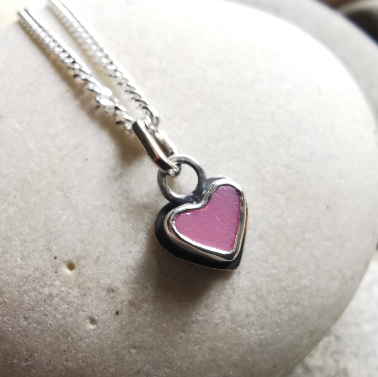 Tiny pink sea glass heart & sterling silver pendant.