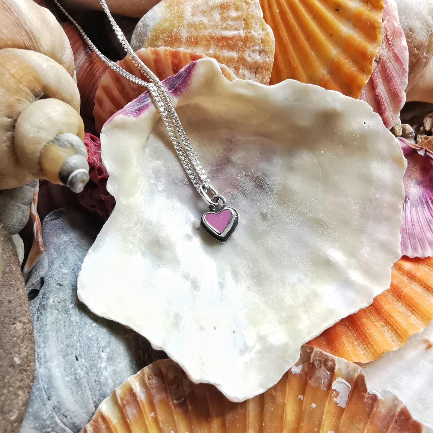 Tiny pink sea glass heart & sterling silver pendant.