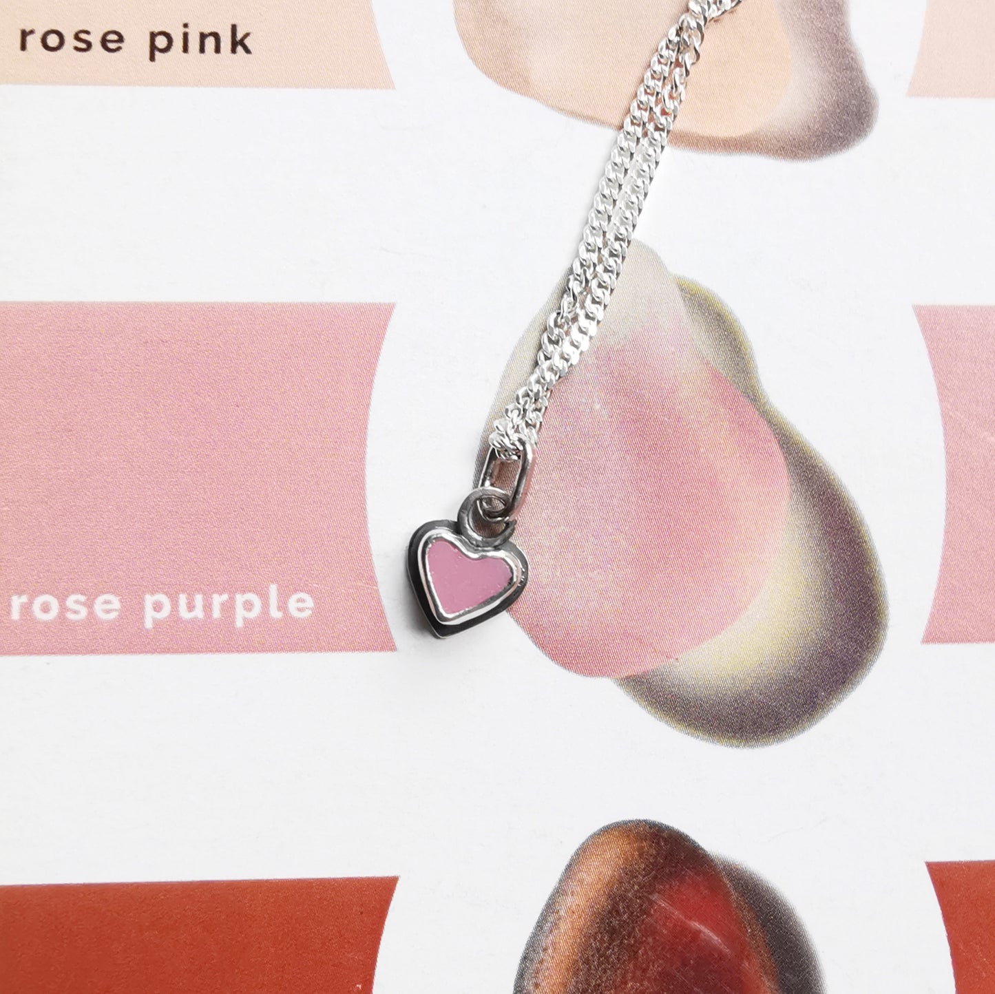 Tiny pink sea glass heart & sterling silver pendant.