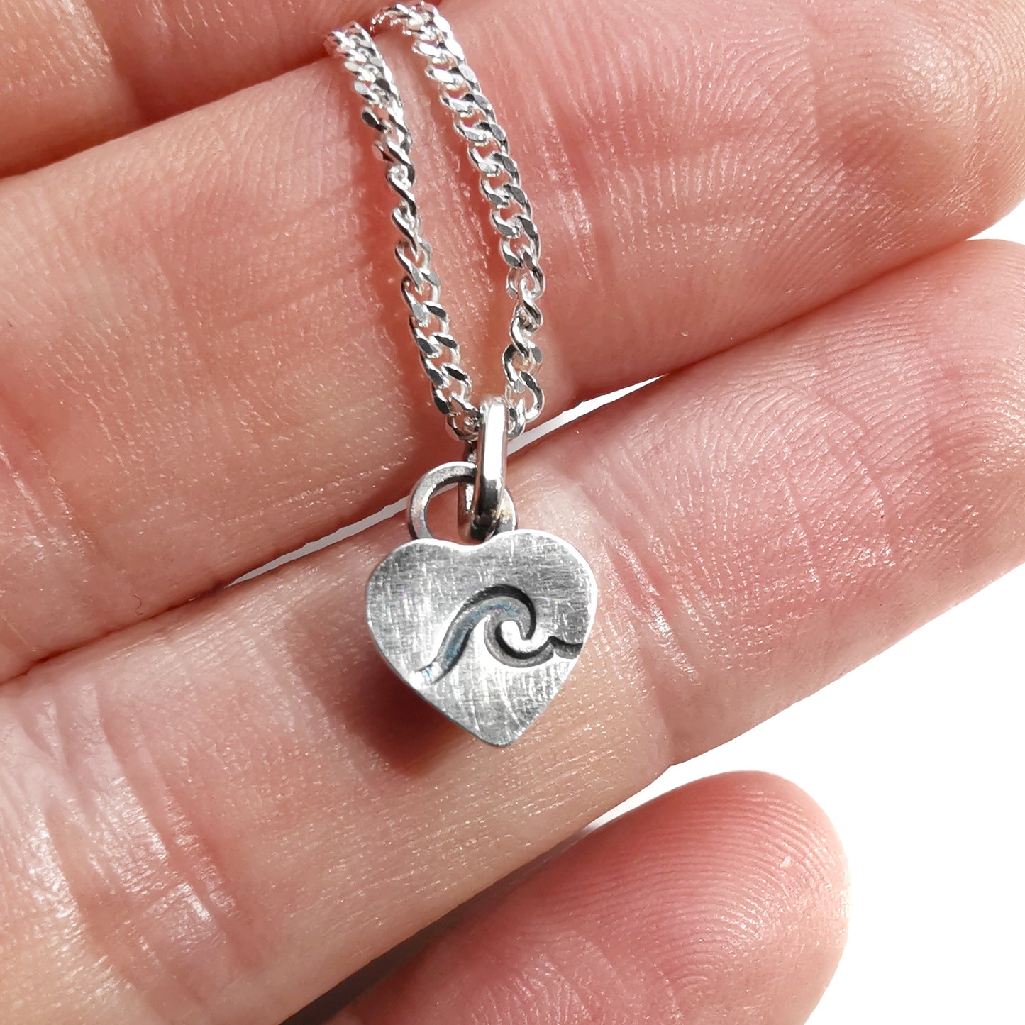 Tiny pink sea glass heart & sterling silver pendant.