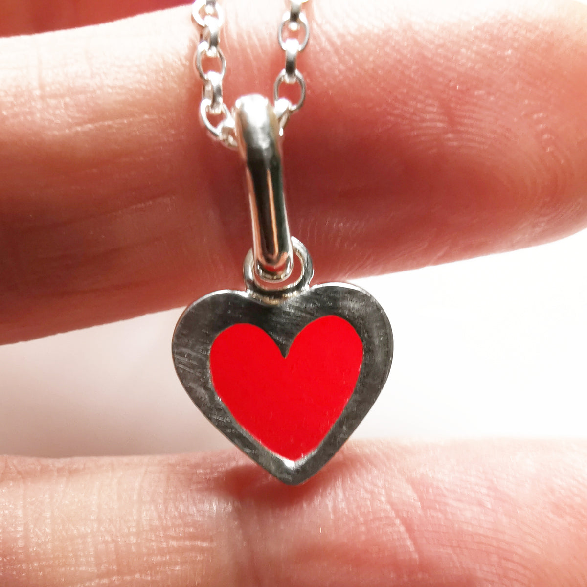 Scottish red sea glass heart & sterling silver pendant.