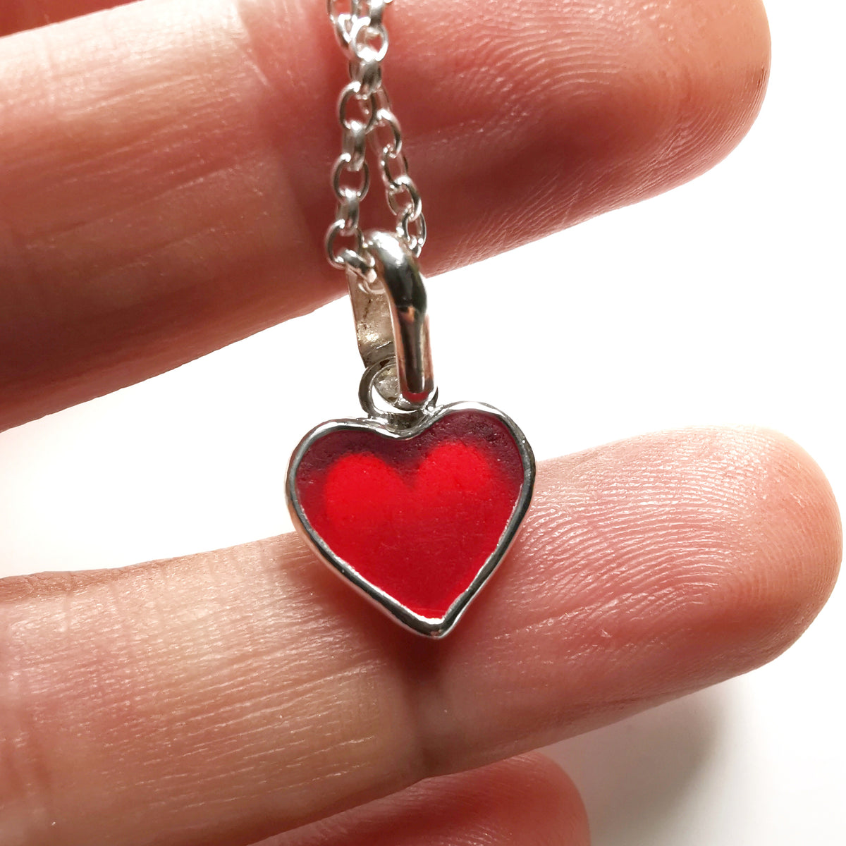 Scottish red sea glass heart & sterling silver pendant.
