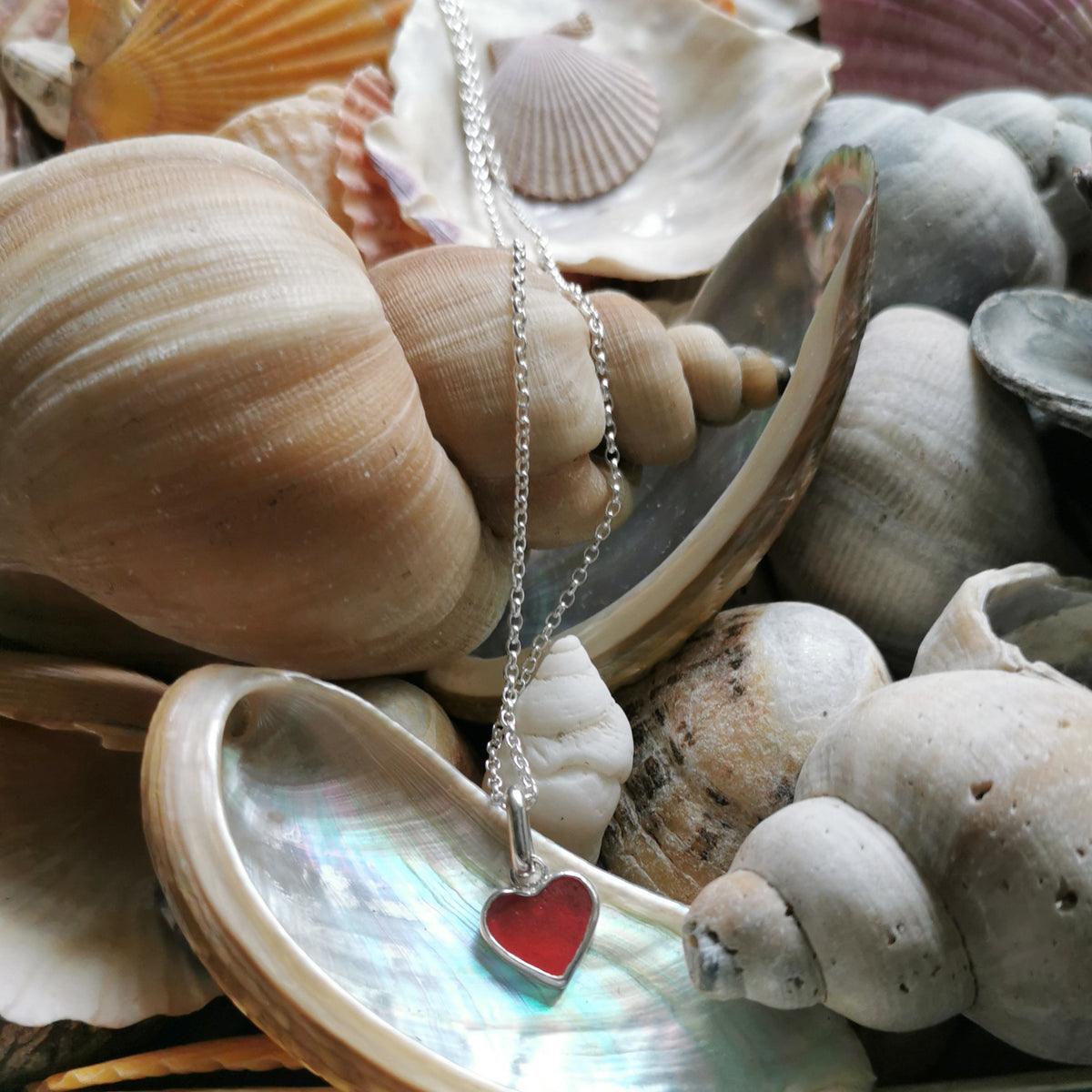 Scottish red sea glass heart & sterling silver pendant.