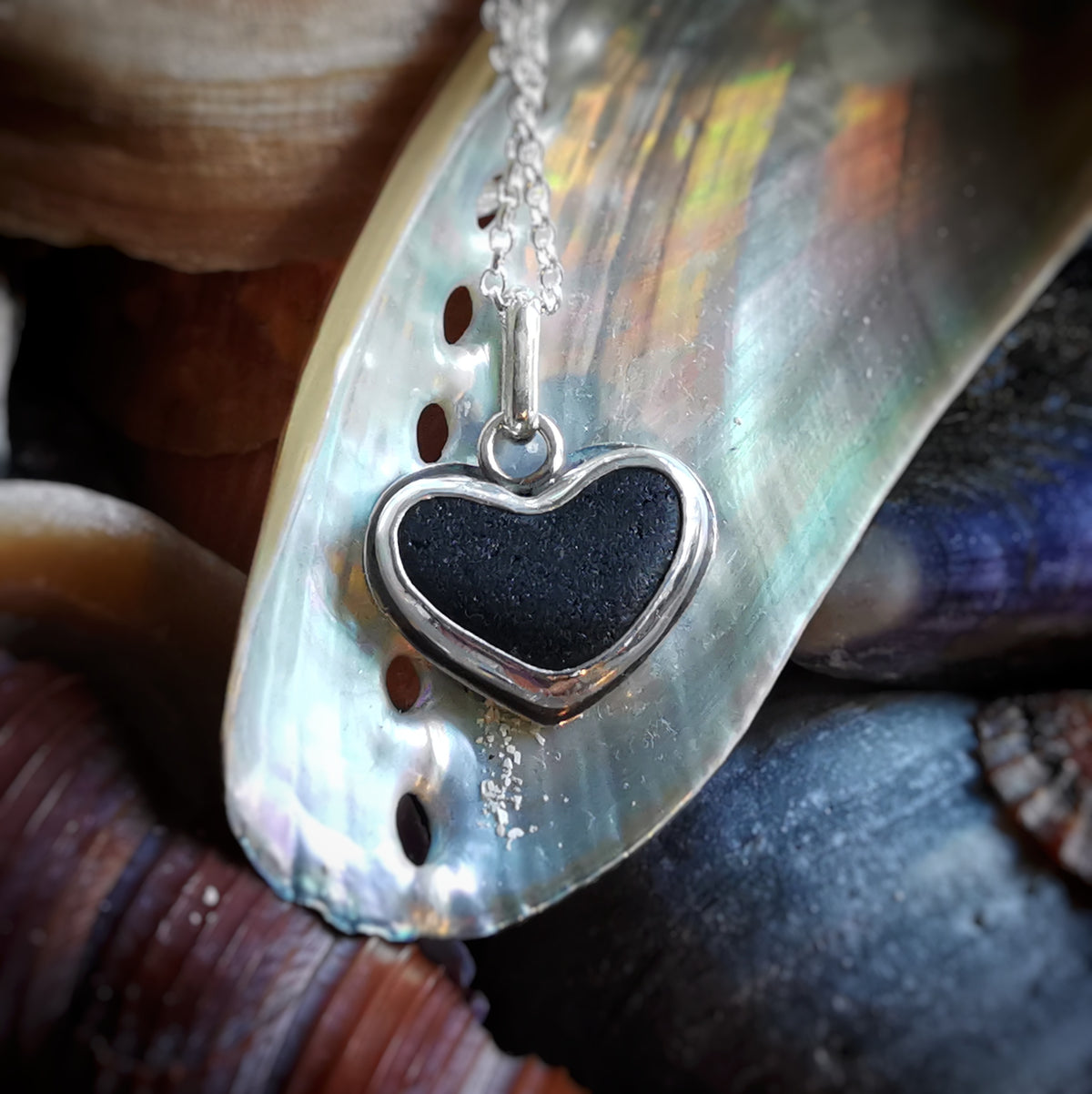 Scottish black sea glass heart & sterling silver pendant.