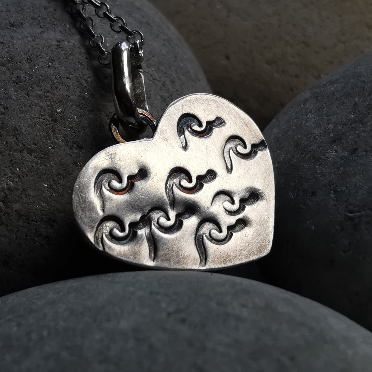 Scottish black sea glass heart & sterling silver pendant.