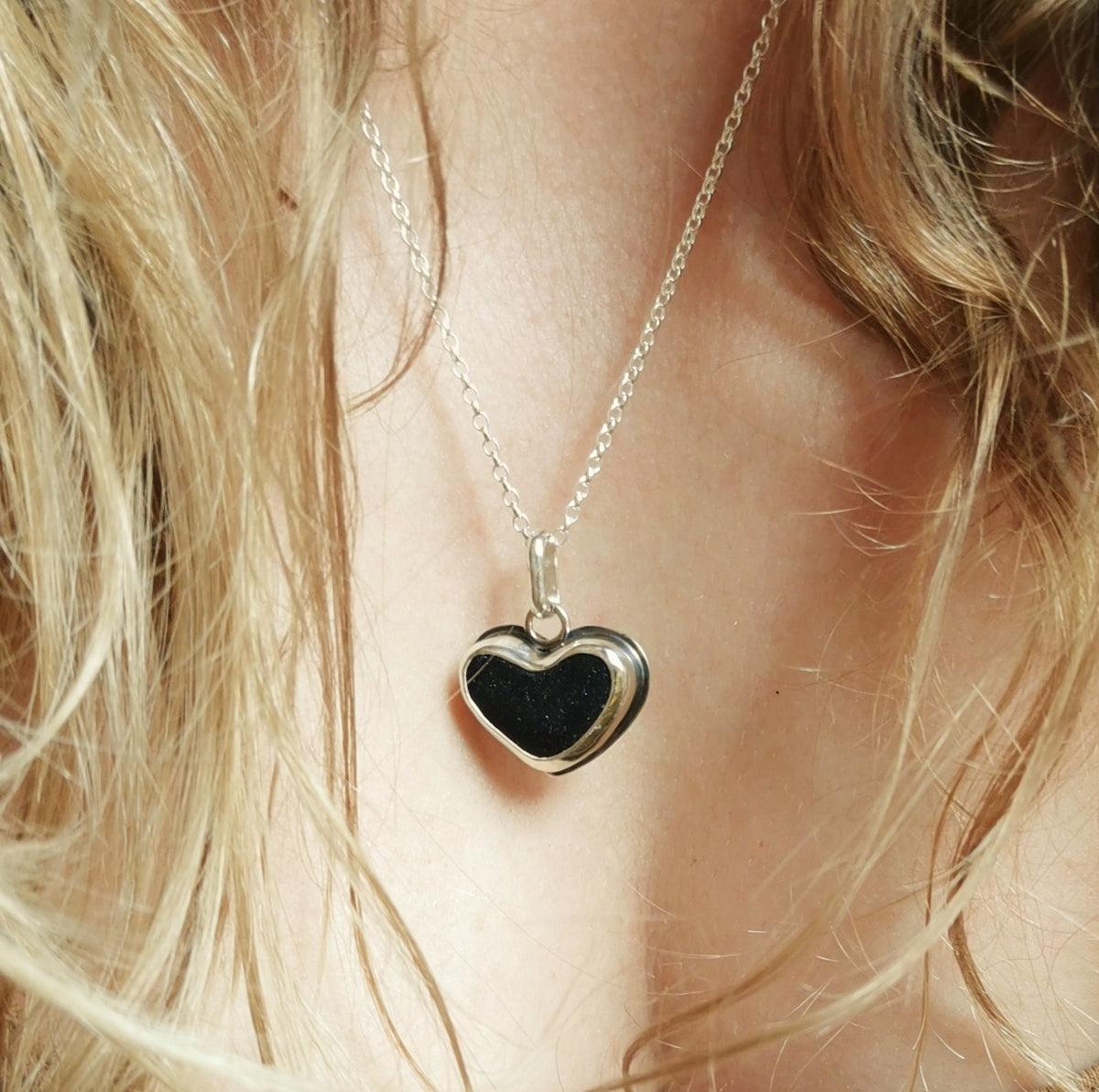 Scottish black sea glass heart & sterling silver pendant.