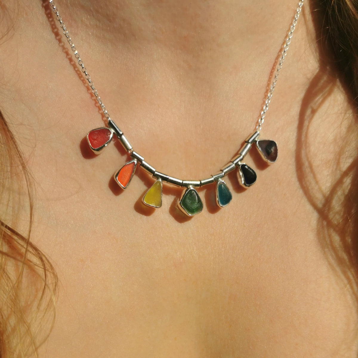Genuine rainbow sea glass & sterling silver necklace.
