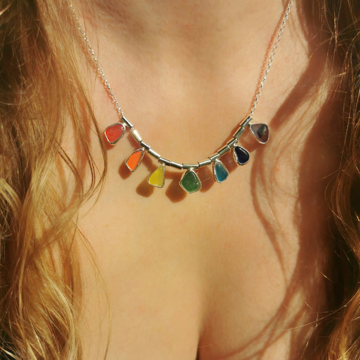 Genuine rainbow sea glass & sterling silver necklace.