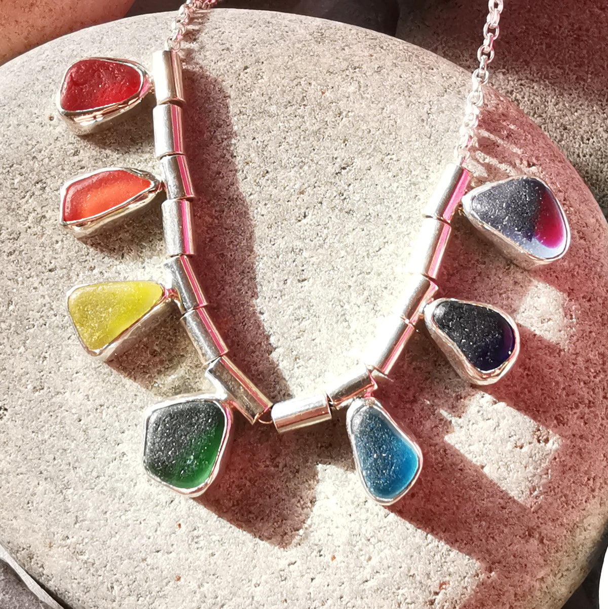 Genuine rainbow sea glass & sterling silver necklace.