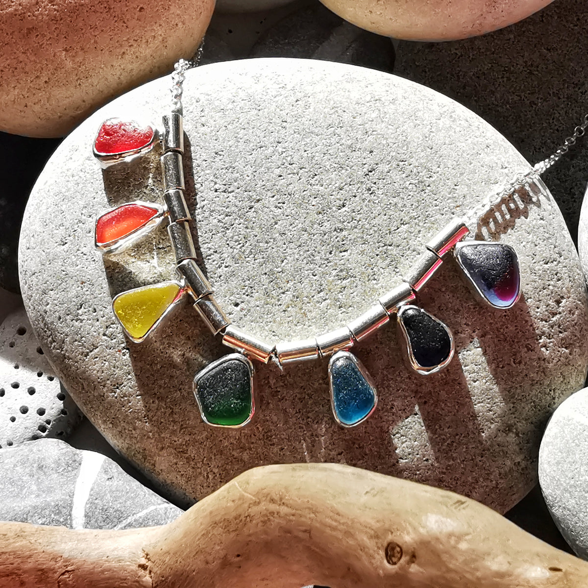 Genuine rainbow sea glass & sterling silver necklace.
