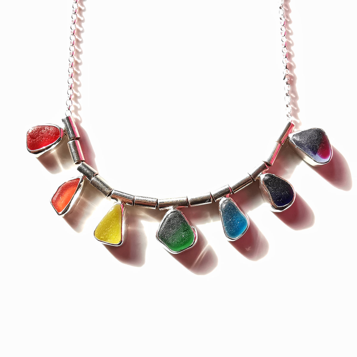 Genuine rainbow sea glass & sterling silver necklace.