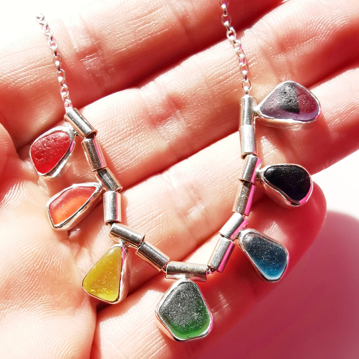 Genuine rainbow sea glass & sterling silver necklace.