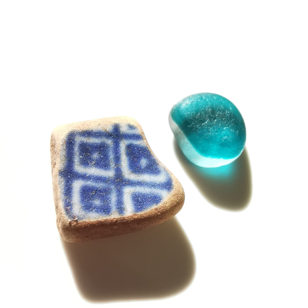 Genuine sea glass and sea pottery, sterling silver necklace.