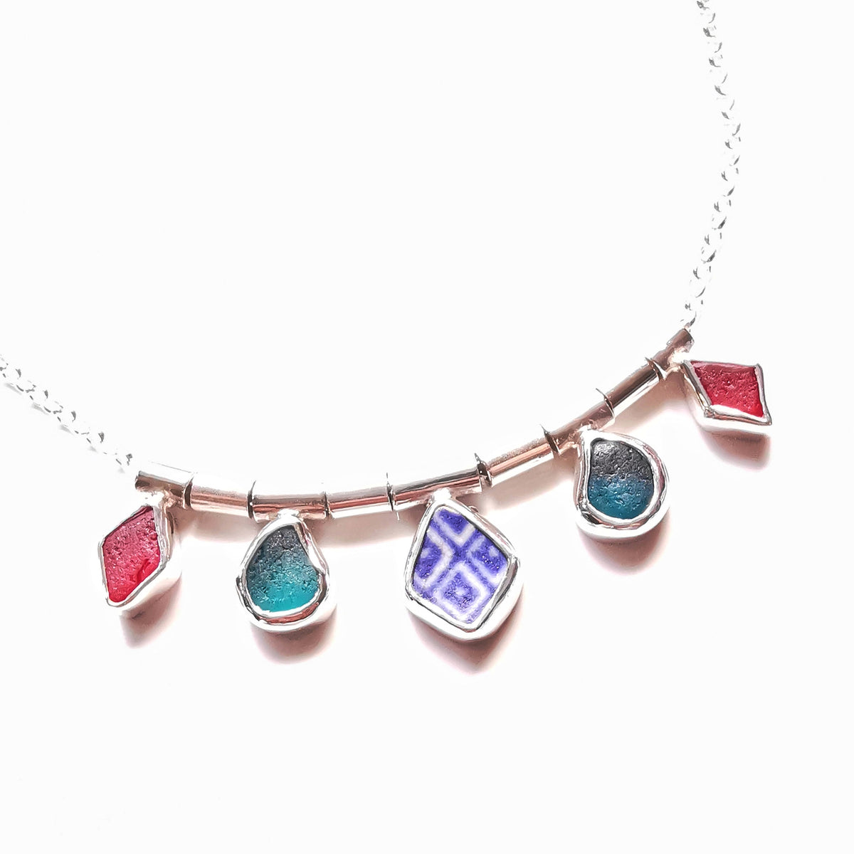 Genuine sea glass and sea pottery, sterling silver necklace.