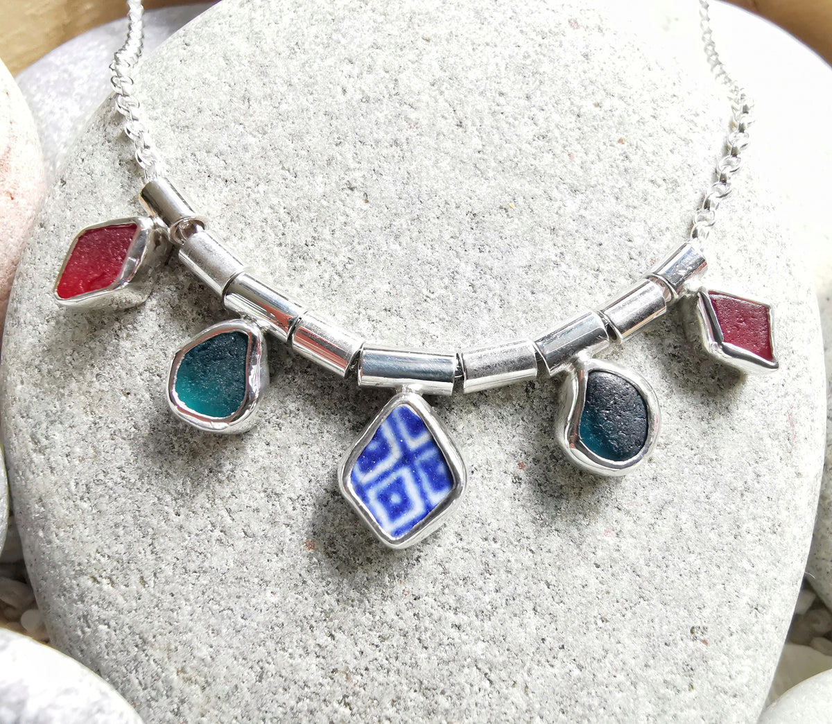 Genuine sea glass and sea pottery, sterling silver necklace.