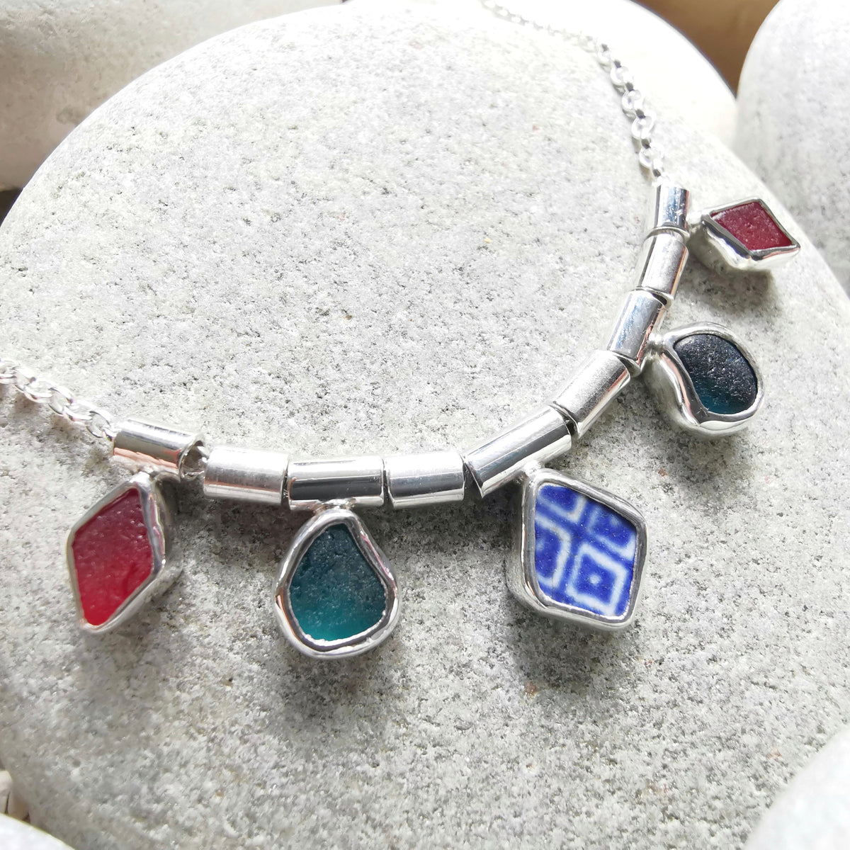 Genuine sea glass and sea pottery, sterling silver necklace.