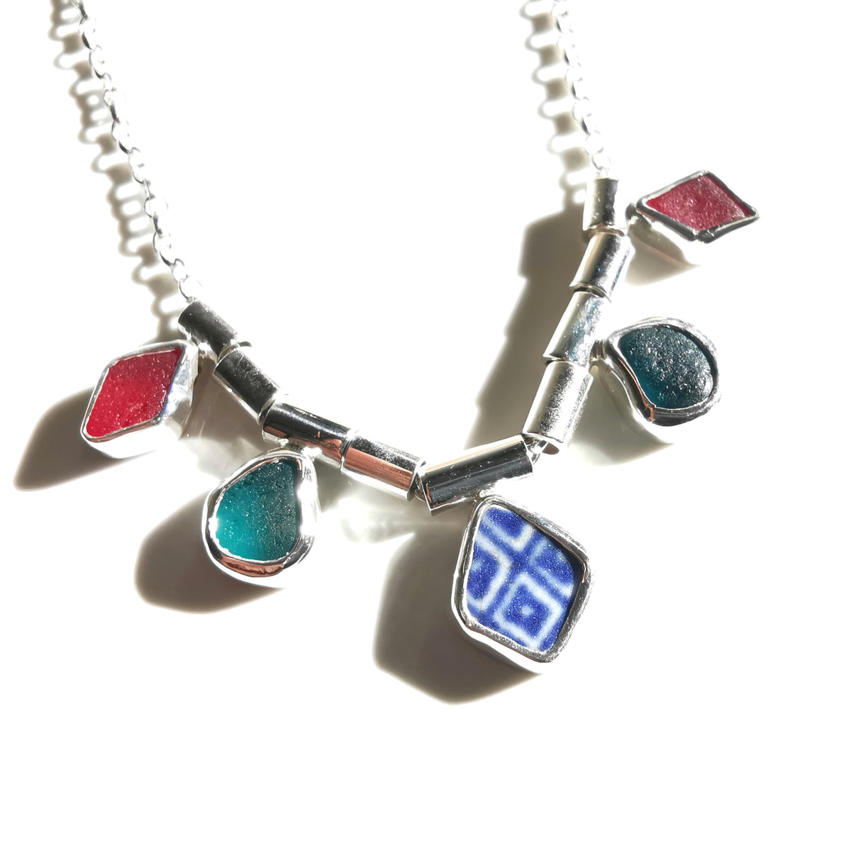 Genuine sea glass and sea pottery, sterling silver necklace.