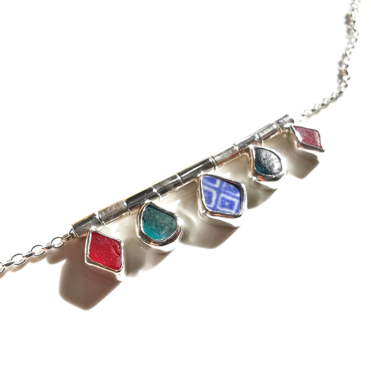 Genuine sea glass and sea pottery, sterling silver necklace.