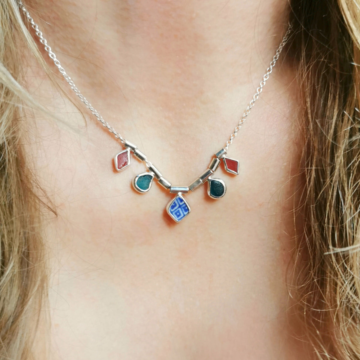 Genuine sea glass and sea pottery, sterling silver necklace.