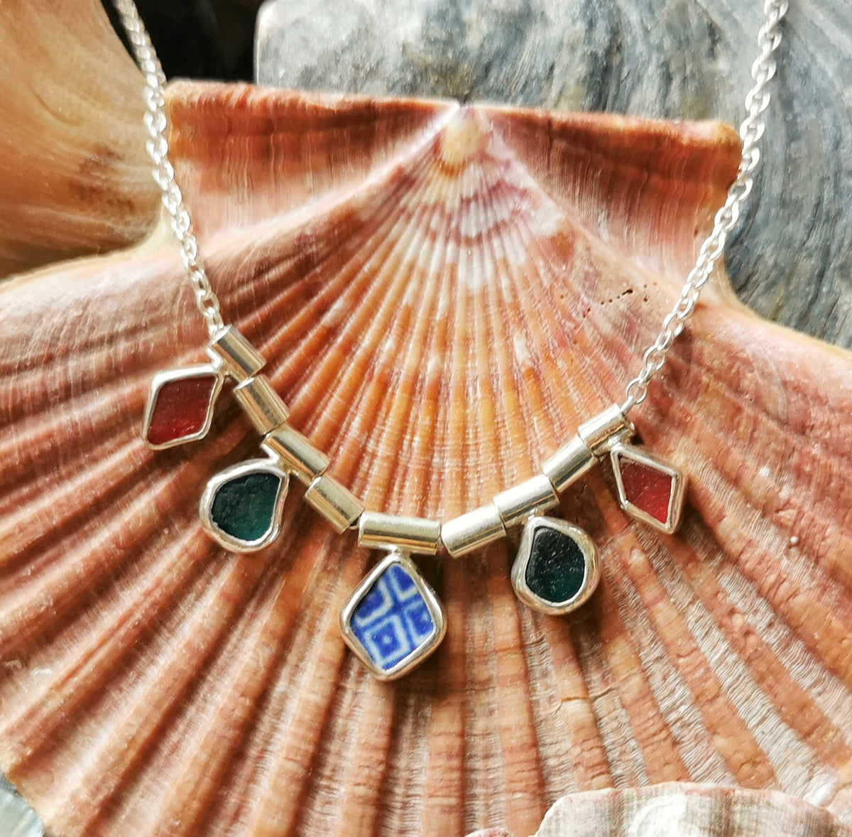 Genuine sea glass and sea pottery, sterling silver necklace.