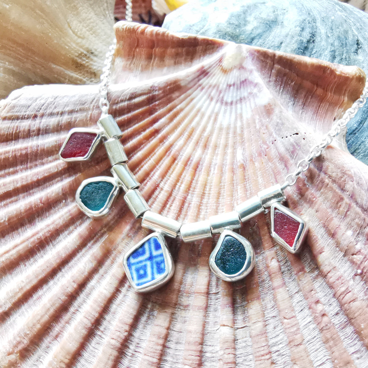 Genuine sea glass and sea pottery, sterling silver necklace.