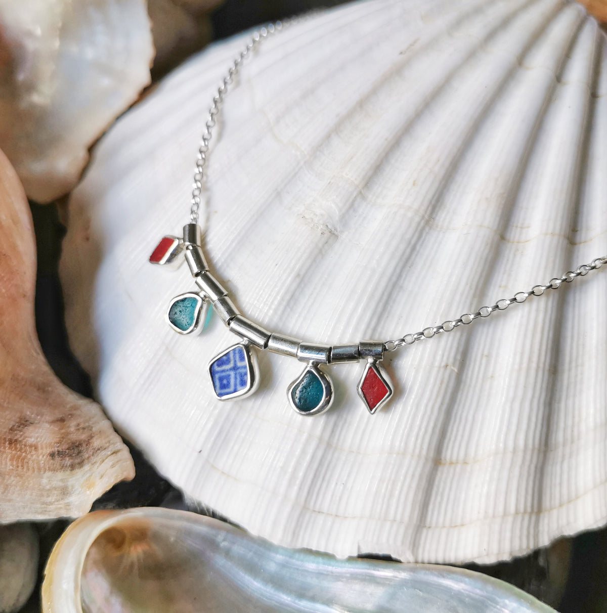 Genuine sea glass and sea pottery, sterling silver necklace.