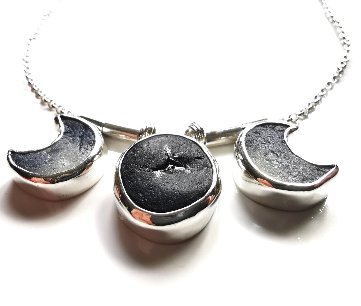 Genuine black and opalescent moon sea glass & sterling silver necklace.