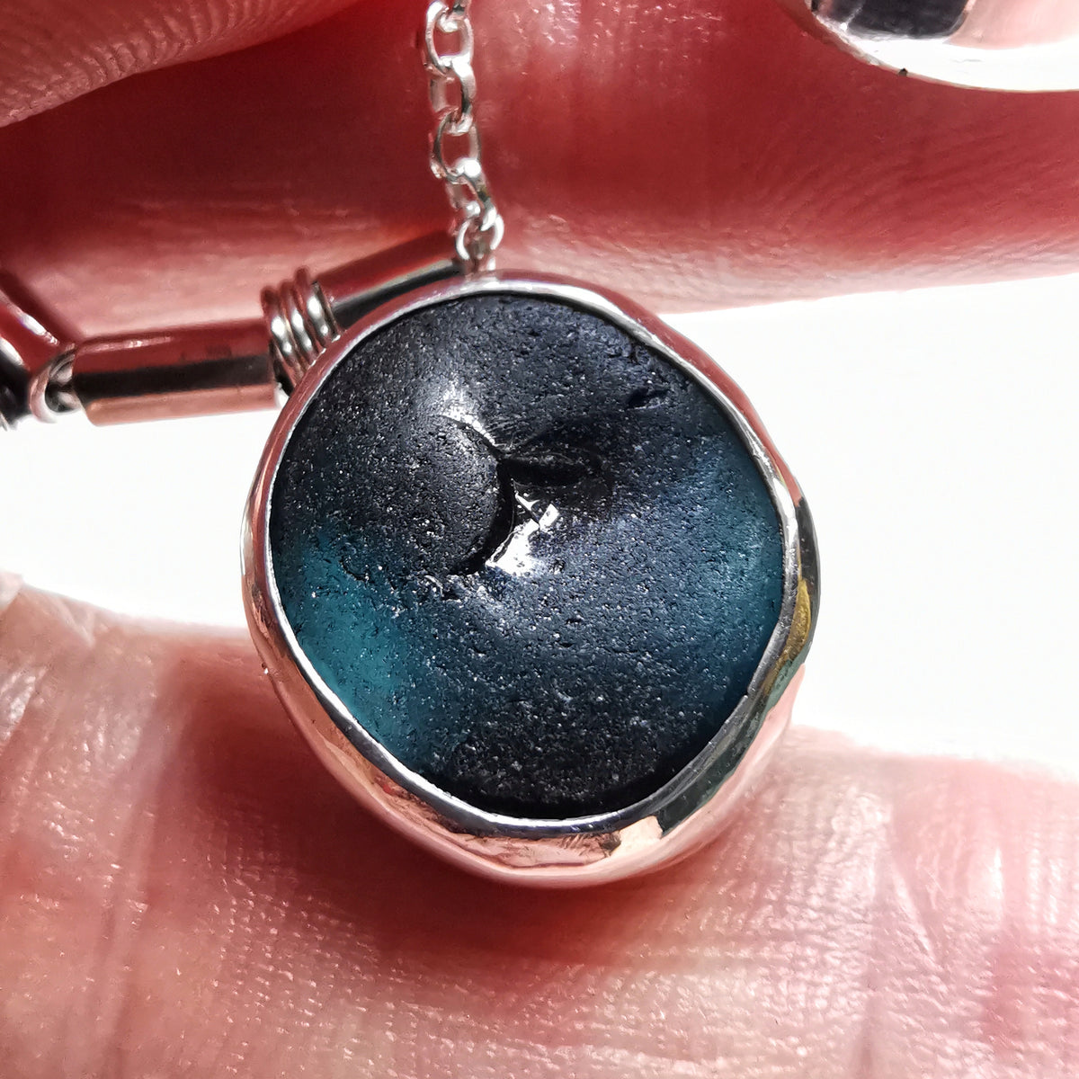 Genuine black and opalescent moon sea glass & sterling silver necklace.