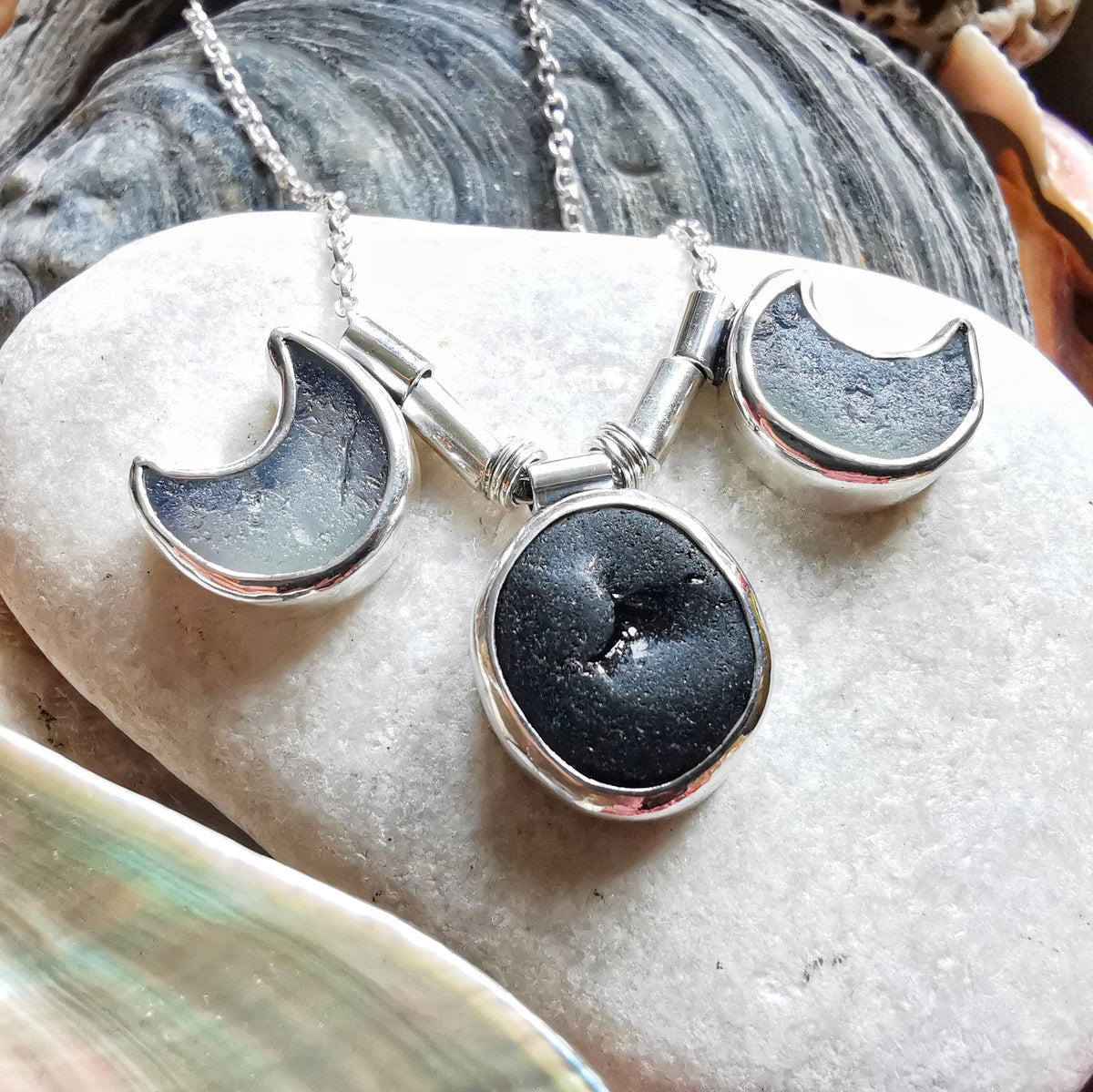 Genuine black and opalescent moon sea glass & sterling silver necklace.